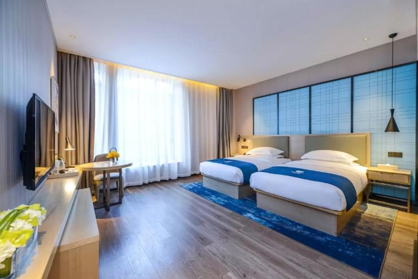 Echarm Hotel Ji'Nan Railway Station Jinan Extérieur photo